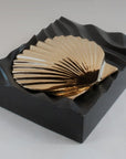Andrew Vallees Show work  Bronze Shell e